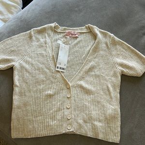NWT Urban Outfitters cream short sleeve ribbed cardigan. Size Small